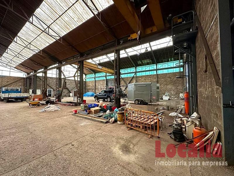 Foto f6e4e5f4-b48f-4ade-bd51-492bd37be9f3. Location bâtiment à usage industriel dans Reocín