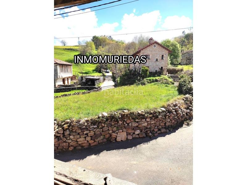 Foto 93eaaa20-826c-4d15-a6ea-01dd89ad1974. Casa adosada casa con jardín para reformar completamente en Selaya