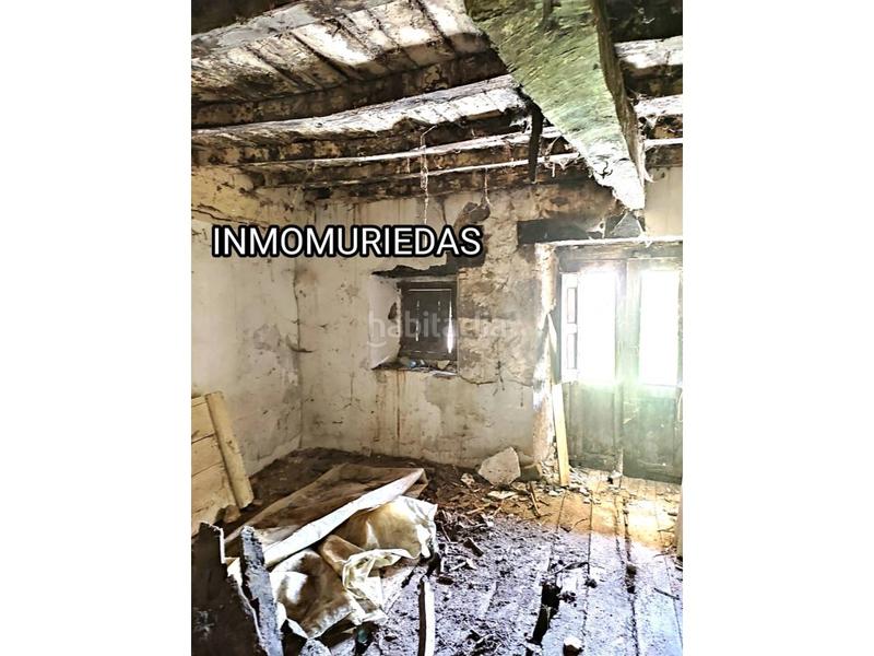 Foto f2e69bfe-73bd-4412-b0b6-faed99bb75ad. Casa adosada casa con jardín para reformar completamente en Selaya