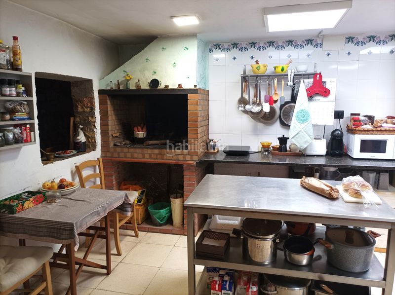 Foto c55632c8-8c84-4d00-b60c-cb6c1a672e01. Maison avec cheminée chauffage dans Santpedor