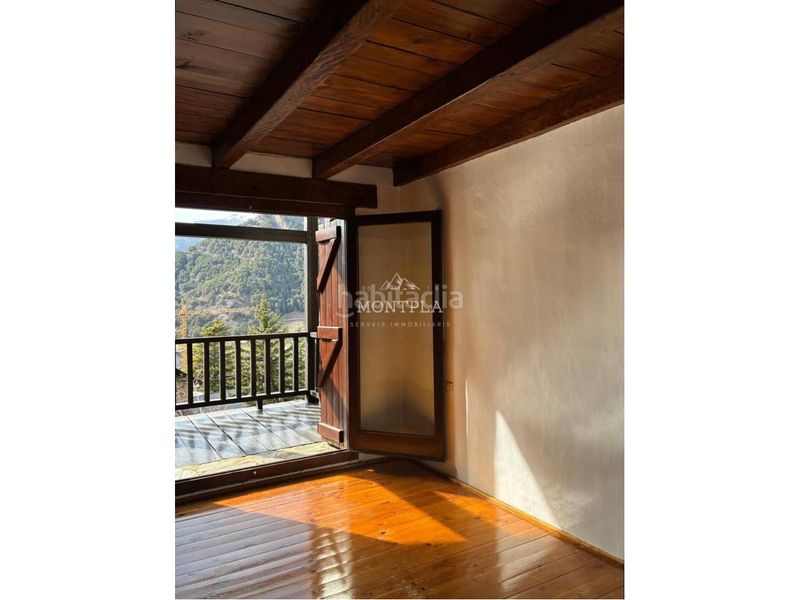 Foto 3b32ae08-6671-4cea-a757-da1cb198ba8e. Casa aparellada amb aparcament a Ordino-ansalonga-sornás Ordino