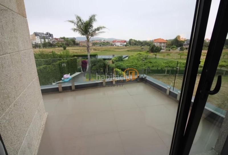 Foto 8dfb8adf-ec9f-466a-94fa-b6c6c3a65541. Chalet en Noalla Sanxenxo