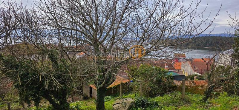Foto b1622b1c-77e8-46c2-a40e-fcf30d3cab4f. Casa en O Carril Vilagarcía de Arousa