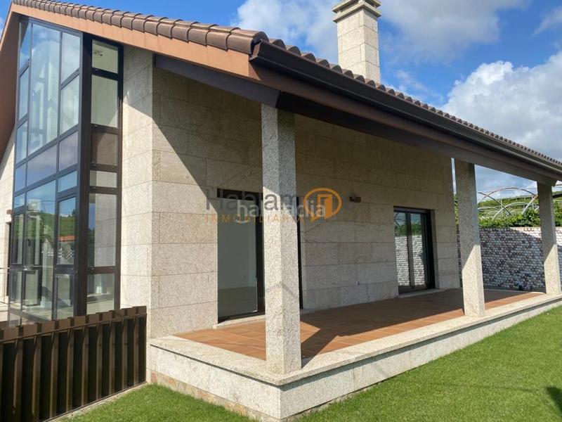 Foto c9a85e36-99fa-4c85-83da-14028a64249a. Chalet con riscaldamento parcheggio in Cambados