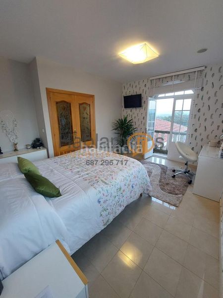 Foto b1bae209-a07b-4b90-b8ce-c61070c217a9. House with heating parking in Vilanova de Arousa