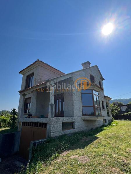 Foto bd76642d-13cd-4c80-9bb2-e8ff97d653c1. Maison avec parking dans Nantes Sanxenxo