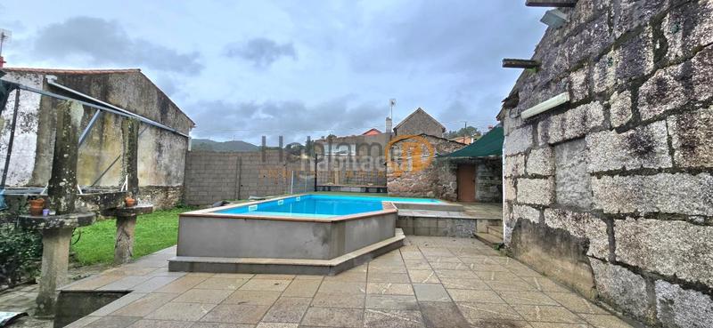 Foto 6a8d9da2-e9f2-4ec3-b66a-a95d11ca55fe. Casa amb aparcament piscina a Arealonga Vilagarcía de Arousa