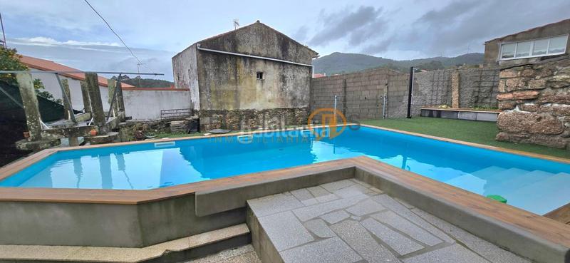 Foto daf962a7-2b67-4782-bb85-d3aa12de1b3a. Maison avec parking piscine dans Arealonga Vilagarcía de Arousa