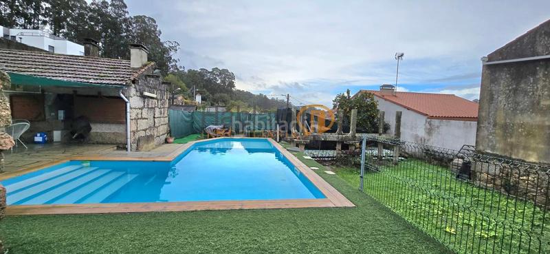 Foto e7d9371a-48b0-44b7-a697-43847e1e6b45. Maison avec parking piscine dans Arealonga Vilagarcía de Arousa