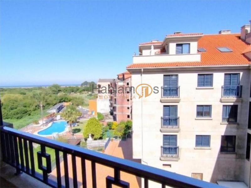 Foto 8d7f36f4-b8c9-4262-a915-58773bf78738. Flat with heating parking pool in Noalla Sanxenxo