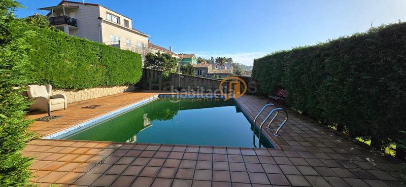 Foto 7da58031-a124-40a4-8022-89bf84a03bf9. Xalet amb calefacció aparcament piscina a Vilagarcía Vilagarcía de Arousa