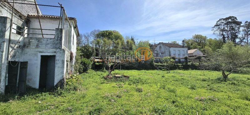 Foto a365fbd0-0d54-479e-bf28-b616148cc817. Casa amb aparcament a Padrón