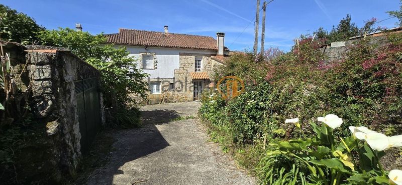 Foto eb116ae2-e94b-441f-9976-5e0efc31d91a. Casa amb aparcament a Padrón