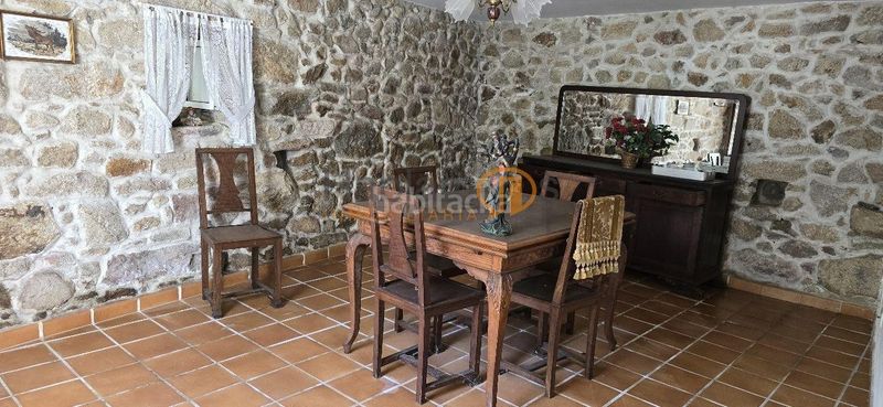 Foto eec8d78c-d26e-4d2d-80df-6d9aa61eca25. Casa amb aparcament a Padrón