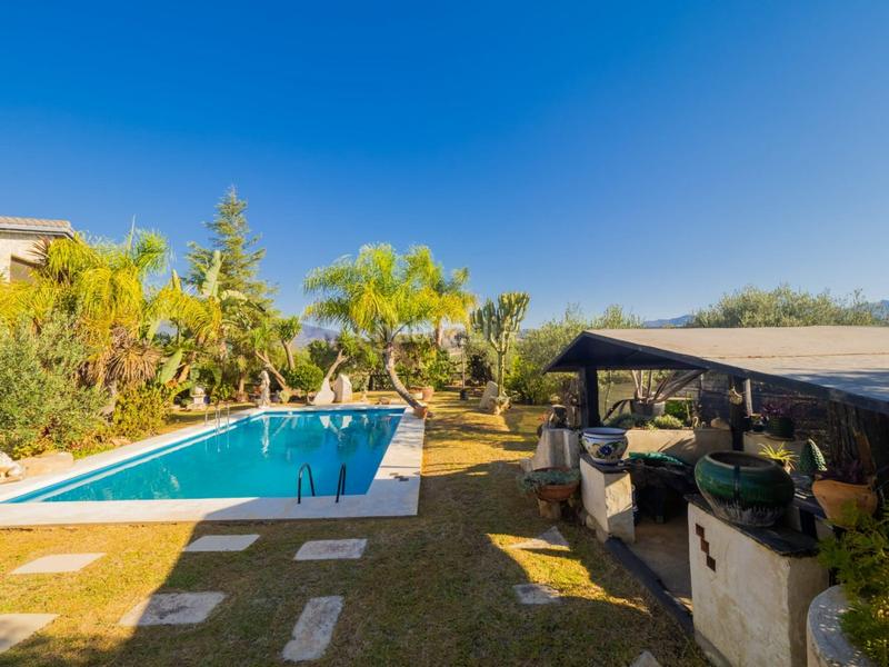 Foto 0ae4d2ff-c26e-4311-b447-5136ee08897a. Masia amb aparcament piscina a Coín