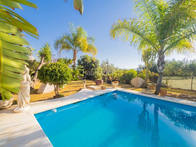 Foto ee0062bc-daa5-4911-867d-7a26cbc314ac. Masia amb aparcament piscina a Coín