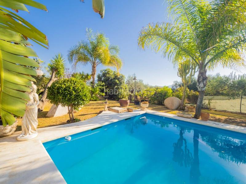 Foto feebc5ec-1483-43bc-bdbc-79b3ec5de9e1. Masia amb aparcament piscina a Coín