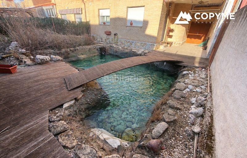 Foto 44b81f7f-ad56-44e7-913b-43b3e6a419dd. Casa adossada amb calefacció piscina a Santa Olalla