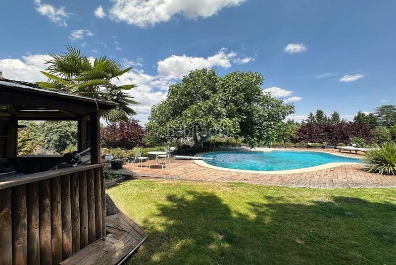 Foto 6fd8d5c5-af11-4b89-a5df-e783f7ce9cc4. Chalet alegre y bellísima casa alta calidad de construcción con estética única en una parcela de casi 5000 metros cuadrad en Ciudalcampo