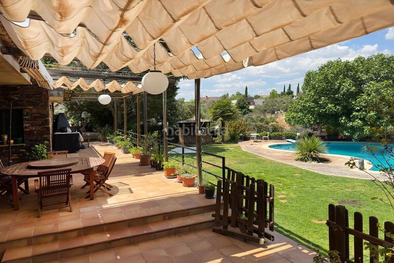 Foto a8eae5d9-01ed-4189-81a2-79f0663783f0. Chalet alegre y bellísima casa alta calidad de construcción con estética única en una parcela de casi 5000 metros cuadrad en Ciudalcampo