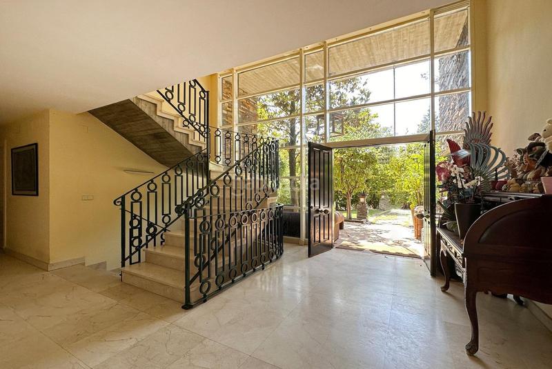 Foto bc2f5eed-9d7a-4ff9-b6a2-90ce8084b02a. Chalet alegre y bellísima casa alta calidad de construcción con estética única en una parcela de casi 5000 metros cuadrad en Ciudalcampo