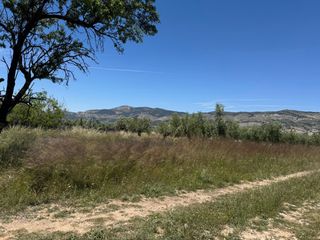 Fondo rustico in Onil. Gran parcela en venta en onil con vistas al castillo