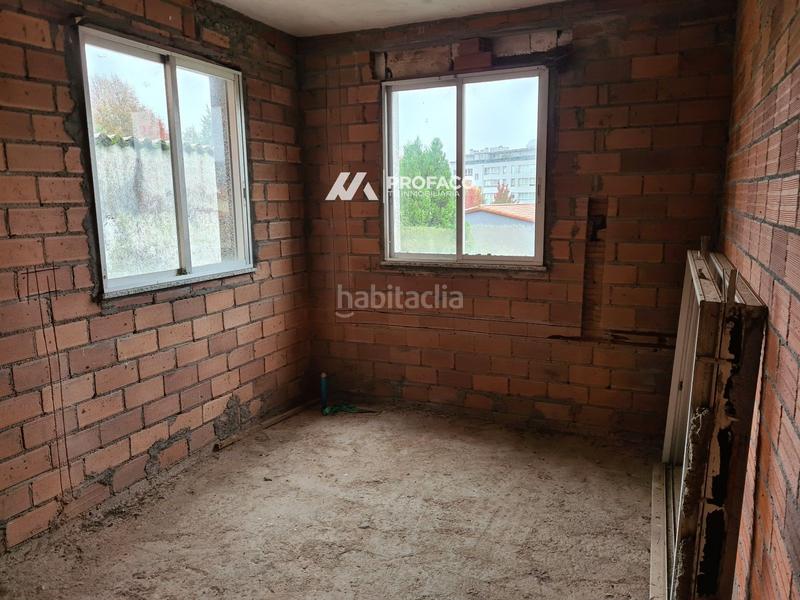 Foto fa9ce9cb-ceb2-4a69-8bb2-6fcb755a2b95. Maison jumelée avec parking dans San Lázaro - Meixonfrío Santiago de Compostela