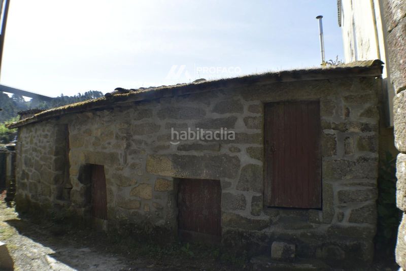 Foto 44fb985f-ff95-4956-971f-ab044b2830f5. Casa adossada a Punxín
