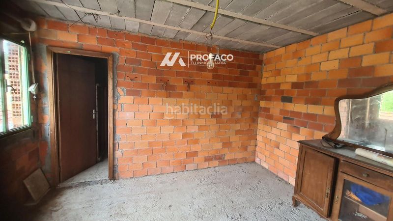 Foto 585dc0e4-b333-4dad-a335-ec26b0b3c095. Casa adossada a Punxín