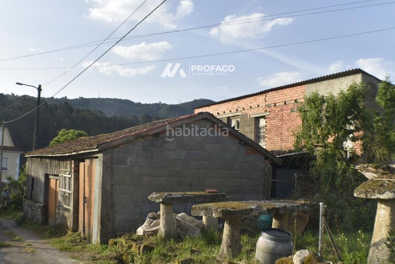 Foto 80180605-585f-475f-a772-a5651a8ffbe9. Casa adossada a Punxín