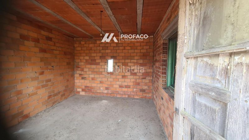 Foto e5f6dfcb-e2d3-4f41-b8f8-32dc737ac349. Casa adossada a Punxín