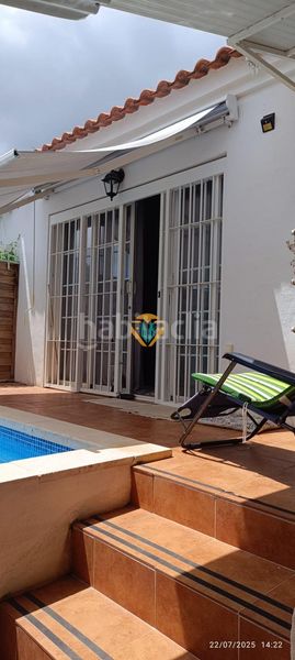 Foto ede0b40f-7e87-4a8e-93c5-24fb8ca90c9c. Casa adossada amb piscina a Varadero Nucia (la)