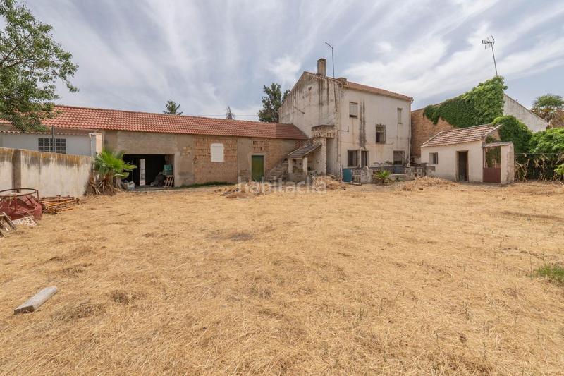 Foto 05911c5b-80bb-4c08-8f0b-b46a196d624b. Casa adosada se vende parcela en el centro de cullar vega con edificación en Cúllar Vega