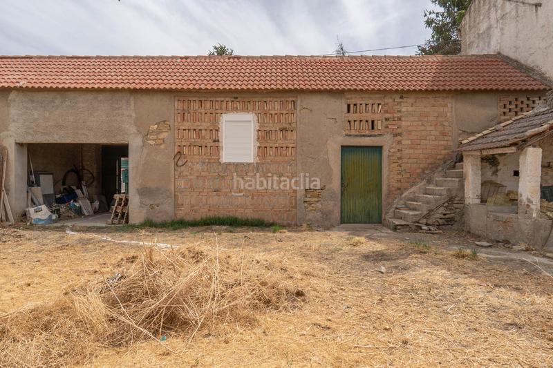 Foto 54ccc0a8-93ef-47ab-9aac-28f7df47a285. Casa adosada se vende parcela en el centro de cullar vega con edificación en Cúllar Vega