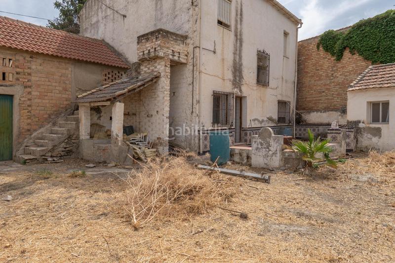Foto 87ad81f4-8082-4857-9bf7-83f0d71bffcc. Casa adosada se vende parcela en el centro de cullar vega con edificación en Cúllar Vega