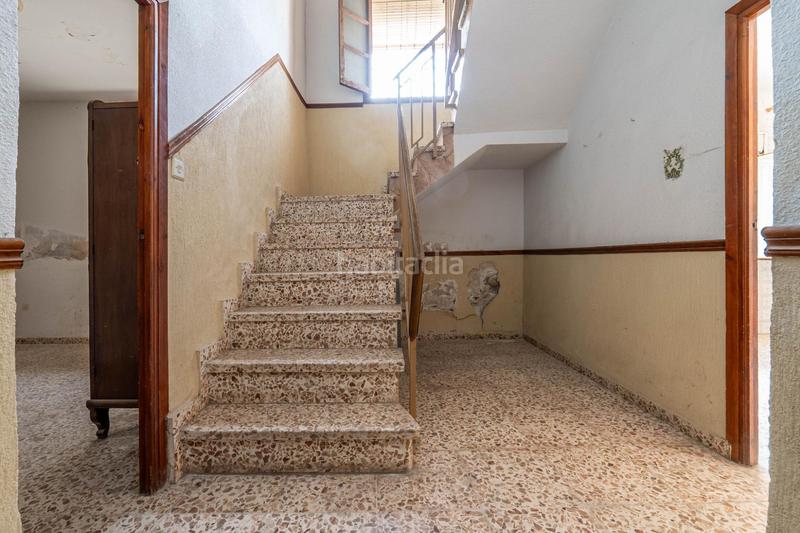 Foto adc07fc1-1a47-48b7-a14c-115fa52c330a. Casa adosada se vende parcela en el centro de cullar vega con edificación en Cúllar Vega