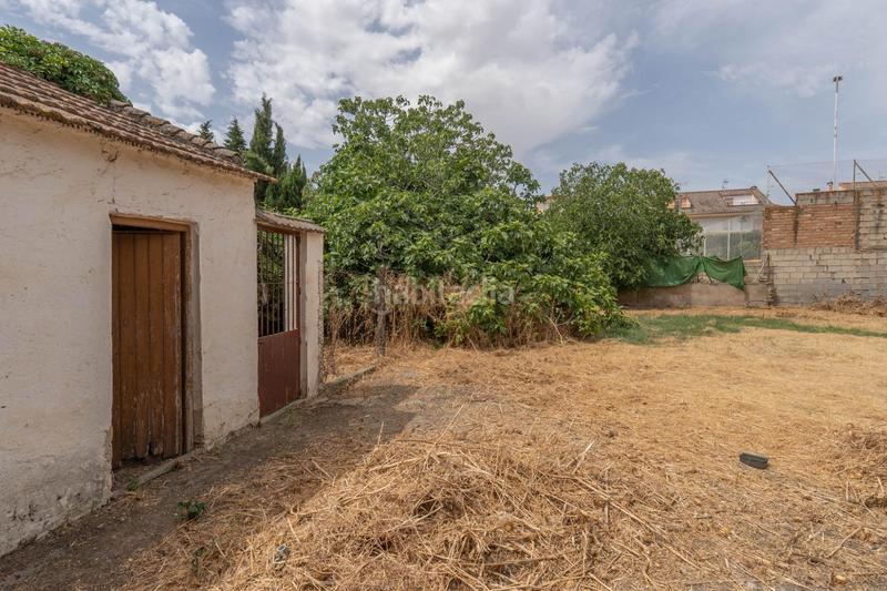 Foto aff26ac9-7803-4b70-ba0a-93fb824a1c0e. Casa adosada se vende parcela en el centro de cullar vega con edificación en Cúllar Vega