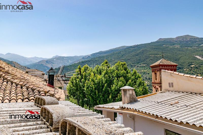 Foto d911f54f-7131-47cd-b715-365d99b2ba6f. Casa adosada casa para reformar en güejar sierra centro en Güéjar Sierra