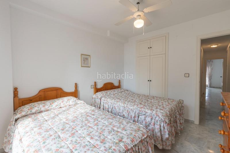 Foto fe9cdf55-85cb-427f-877e-5a2f2f53b6a2. Casa adosada preciosa casa en la urbanización de la perla en Motril