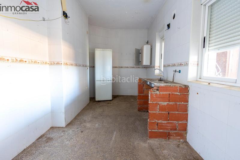 Foto 2e81b788-f560-458e-a0a6-f8567834fc51. Casa  de 6 dormitorios con local y terraza de 100 m2 en Armilla