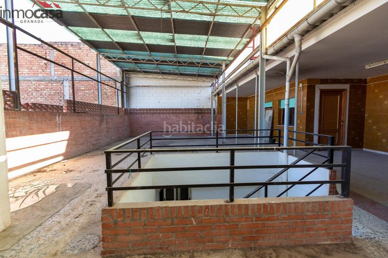 Foto c0f16515-123c-4a6e-9b85-3498fcf4ba52. Casa  de 6 dormitorios con local y terraza de 100 m2 en Armilla