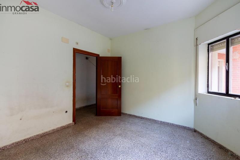 Foto e6080a6a-5165-4871-91d8-bd35337cc01d. Casa  de 6 dormitorios con local y terraza de 100 m2 en Armilla
