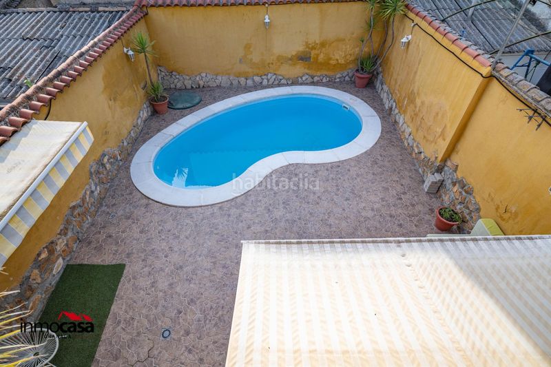 Foto 99875394-6645-4634-9c83-33a6173e0066. Casa adossada amb aparcament piscina a Atarfe