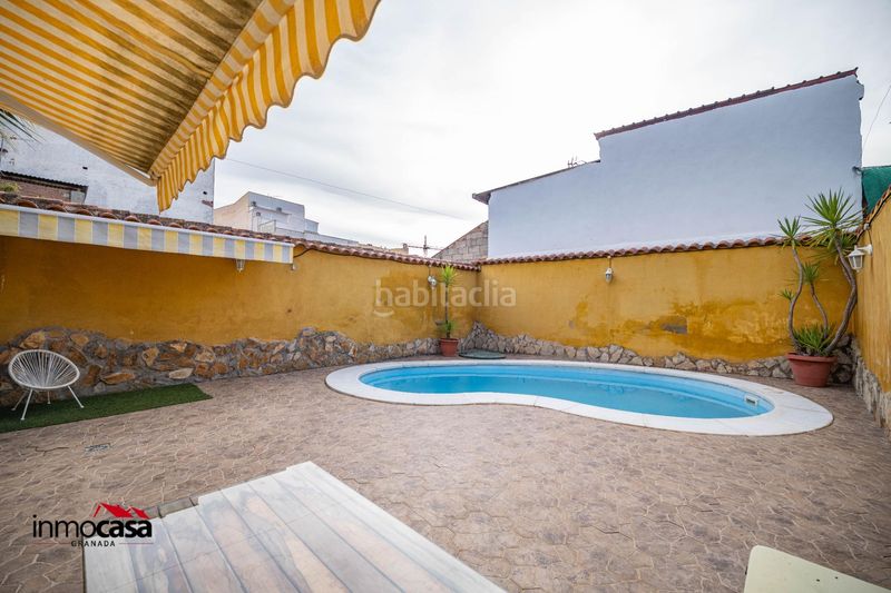 Foto a0557670-76e7-4f95-8c09-17c5769acb7f. Casa adossada amb aparcament piscina a Atarfe