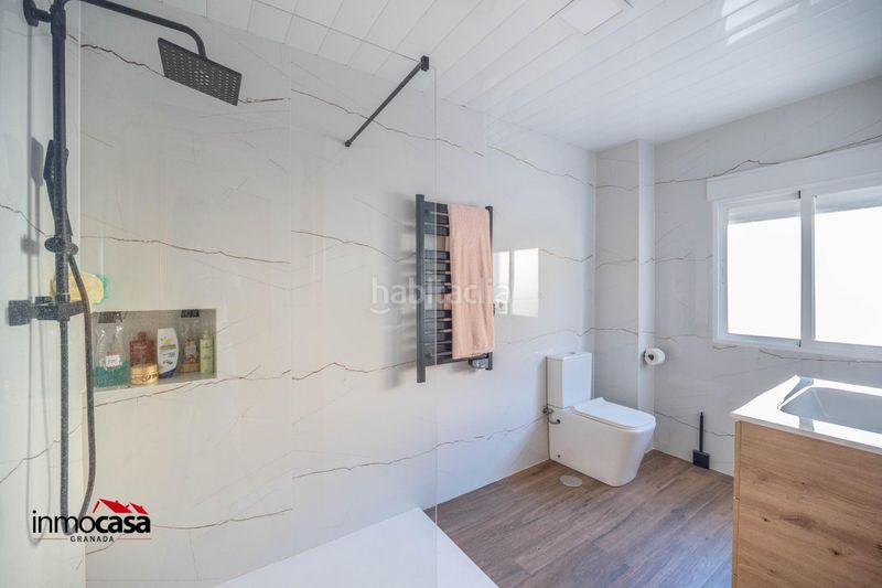 Foto ef4b5a9c-e67b-45b7-9b30-814ca3542912. Casa adossada amb aparcament piscina a Atarfe