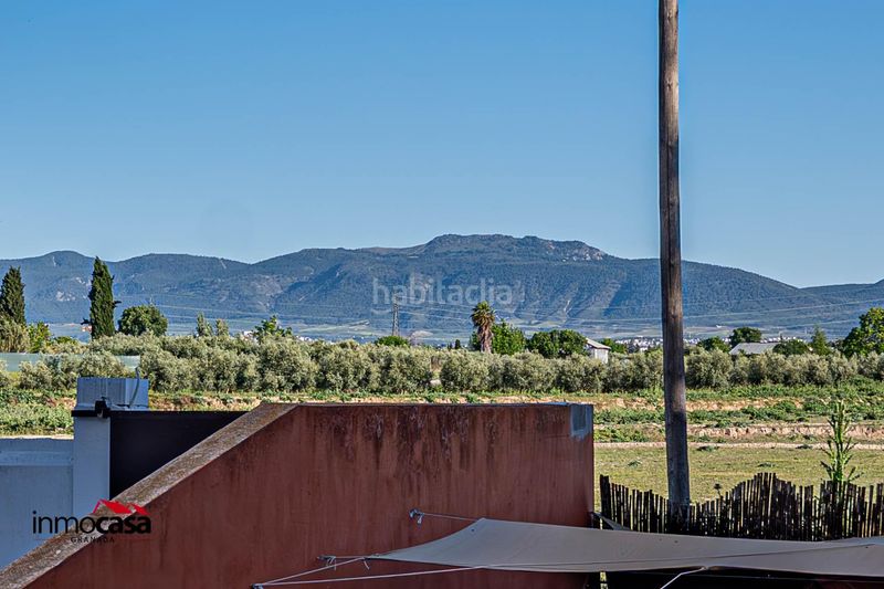 Foto d46758c4-3f28-4a9e-8f42-7a9eb74d2cc0. Casa adossada amb aparcament a Cúllar Vega
