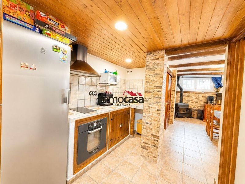 Foto f5e03338-c493-49d1-a9b2-745d35e35775. Casa adossada amb aparcament a Cájar