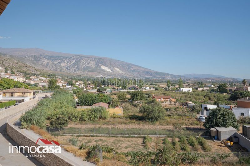 Foto c92a2860-ed40-4dd6-afca-d2ae837554c5. Pis amb aparcament a Padul