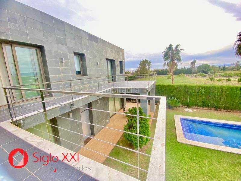 Foto 0526e1f7-f79a-40db-a70e-43f17bbfa011. Chalet avec chauffage parking piscine dans Playa Burriana