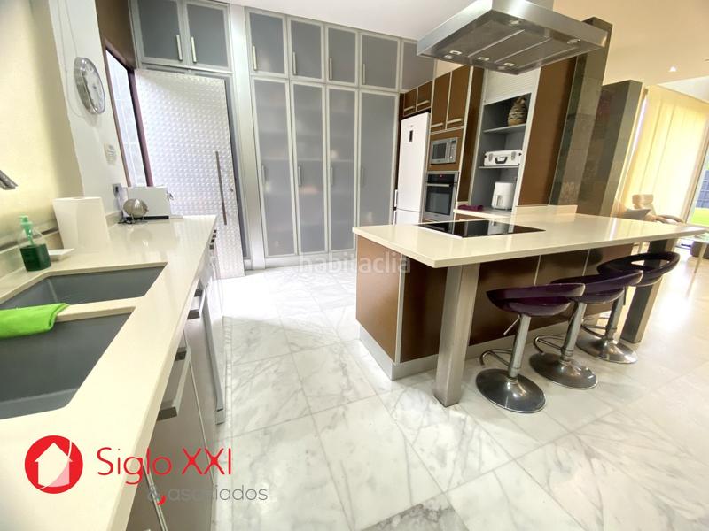 Foto 10f25bf2-25db-48b1-a098-1bd4e66ccff8. Chalet avec chauffage parking piscine dans Playa Burriana